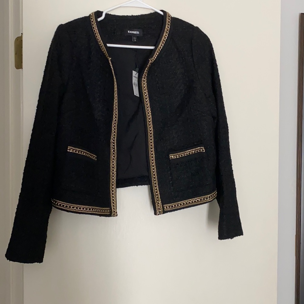Really cute express jacket with chain detail.